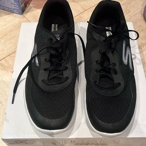 used black sketchers sneakers